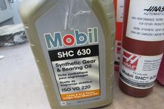 Assorted Oils & Funnel