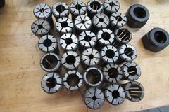 (8) Valenite V40CT4/57860/4 DA180 Collet Style Cat 40 Tool Holders with Approx (28) Assorted DA180 Collets
