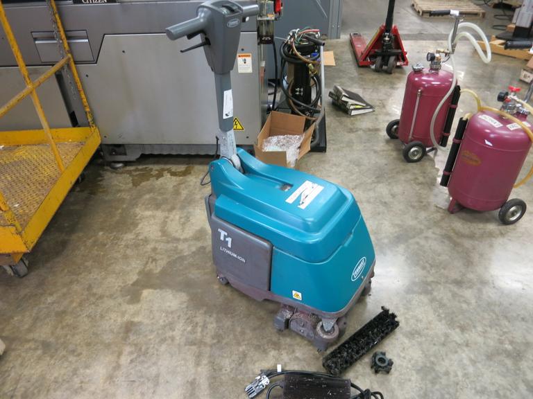 Tennant Model T1 Lithium Ion Walk Behind Floor Scrubber with Charger.  2773 Hours on Meter.