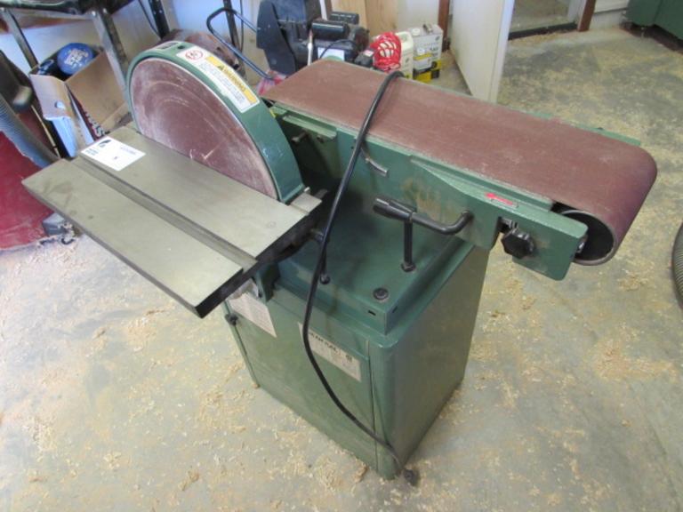 General International Model 15-015M1 Belt/Disc Sander.  12" Disc, 6" Wide Belt, 7"x16" Slotted Tilting Table, Cabinet Base, 120V Single Phase