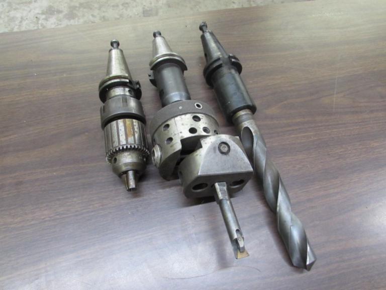 (3) Cat 40 Tool Holders: (1) Collet Type with Jacobs 1/8" to 5/8" Capacity Drill Chuck; (1) End Mill Type with Boring Head; (1) Morse Taper Type with Drill