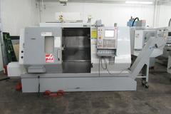 Haas SL-30 CNC Turning Center with Live Tooling, C-Axis, Geared Spindle, Programmable Tailstock, Tool Presetter- with Brand New Haas Spindle