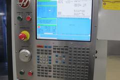 Haas VF-4SS CNC Vertical Machining Center with 1000 PSI Through Spindle Coolant, Renishaw Tool & Parts Probes, and High Speed Machining.