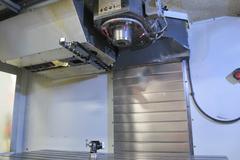 Haas VF-4SS 5-Axis CNC Vertical Machining Center with Haas TR160Y Compact Trunnion Table, 1000PSI Through Spindle Coolant, Renishaw Probing System, and High Speed Machining.