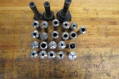 (21) Assorted R8 Collets and (3) R8 Shank Shell Mills