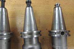 (5) Shell Mill Type Cat 40 Tool Holders, (4) With Cutters