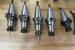 (9) ER20 Cat 40 Tool Holders with Collets and Wrench