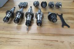 (9) ER20 Cat 40 Tool Holders with Collets and Wrench