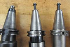 (5) Shell Mill Type Cat 40 Tool Holders, (4) With Cutters