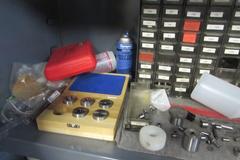 Heavy Duty 2-Door Cabinet with 4" Deep Storage Doors and Contents of Misc Gun Drill Bushings, Filters and More