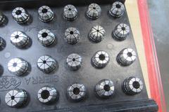 (40) Assorted ER16 Collets with Rack