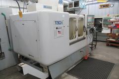 Milltronics VM24 Series C CNC Vertical Machining Center w Centurion 6 CNC Control, Troyke 4th Axis Table, 20 Station Tool Changer