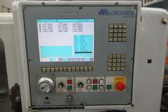 Milltronics VM24 Series C CNC Vertical Machining Center w Centurion 6 CNC Control, Troyke 4th Axis Table, 20 Station Tool Changer