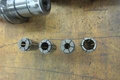 Nikken Cat 40 Taper Tool Holders, (2) Nikken SK-10 Collet Holders, (2) Nikken SK-20 Collet Holders Assorted SK-20 Collets