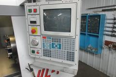 Haas HL-1 CNC Turning Center with SMW SPacesaver Bar Loader