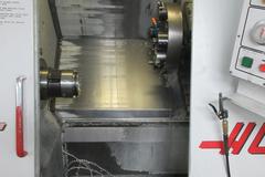 Haas HL-1 CNC Turning Center with SMW SPacesaver Bar Loader