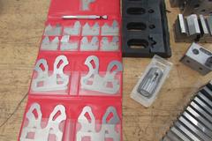 Assorted Toolmaker's Items: Radius Gages, Toe Clamps, V-Blocks, Angle Blocks, Edge Finders and More