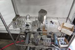 NSF Stainless Wire Rack with Contents of Chuck Jaws and More