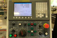 SNK Prodigy GT-27 CNC Gang Tool Lathe, Fanuc Series Oi Control,  C-Axis Programmable Spindle with Penumatic Driven Live Tools, Barfeeder, and Additional Tooling!