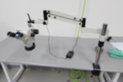 Omano Stereo Zoom Microscope with Articulating Bench Mount Arm with .65 to 4.5 Power Zoom ,  SWF10x/22 Eyepieces and Ring Light