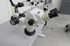 Omano Stereo Zoom Microscope with Articulating Bench Mount Arm with .65 to 4.5 Power Zoom ,  SWF10x/22 Eyepieces and Ring Light
