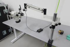 Omano Stereo Zoom Microscope with Articulating Bench Mount Arm with .65 to 4.5 Power Zoom ,  SWF10x/22 Eyepieces and Ring Light