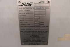 Haas SL-30 2-Axis CNC Turning Center with Programmable Tailstock, Tool Presetter, Chip Conveyor, and more.