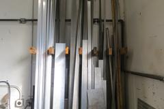 Large Assortment Material Including Extruded Aluminum, Aluminum Flat Stock, Steel Flat Stock, Steel Bar Stock and MORE!