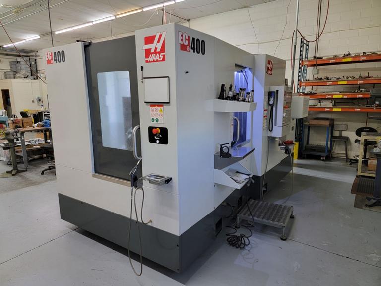 Haas EC-400 CNC 4-Axis Horizontal Machining Center with (2) Station Pallet Changer, 15,000 RPM Spindle, Full 4th Axis, 1000 PSI Through Spindle Coolant, High Speed Machining, and Probing.