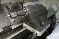 Haas ST-30 2-Axis CNC Turning Center with 12" 3-Jaw Chuck, Tool Presetter, Programmable Tailstock, and Chip Conveyor.