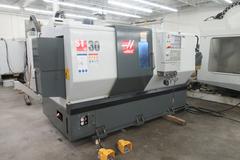 Haas ST-30 2-Axis CNC Turning Center with 12" 3-Jaw Chuck, Tool Presetter, Programmable Tailstock, and Chip Conveyor.