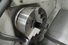 Haas ST-30 2-Axis CNC Turning Center with 12" 3-Jaw Chuck, Tool Presetter, Programmable Tailstock, and Chip Conveyor.