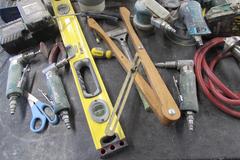 Assortment of Tools: Pneumatic Grinders, Cordless Drill, Level, Abrasives, and More