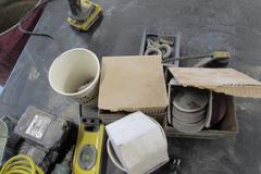 Assortment of Tools: Pneumatic Grinders, Cordless Drill, Level, Abrasives, and More