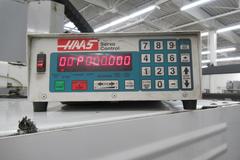 Haas VF-4 CNC 4+1 Axis Vertical Machining Center, 40 Station ATC, Haas TR-160 2-Axis Programmable Rotary Table, 10K RPM, Thru-Spindle Coolant