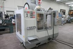 Haas VF-2SS CNC Vertical Machining Center with Through Spindle Coolant, 4th Axis Drive and Wiring, and Renishaw Probing System.