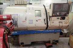 Okuma Crown 762S-SB CNC 2-Axis Turning Center with OSP-U10L Control and Chip Conveyor