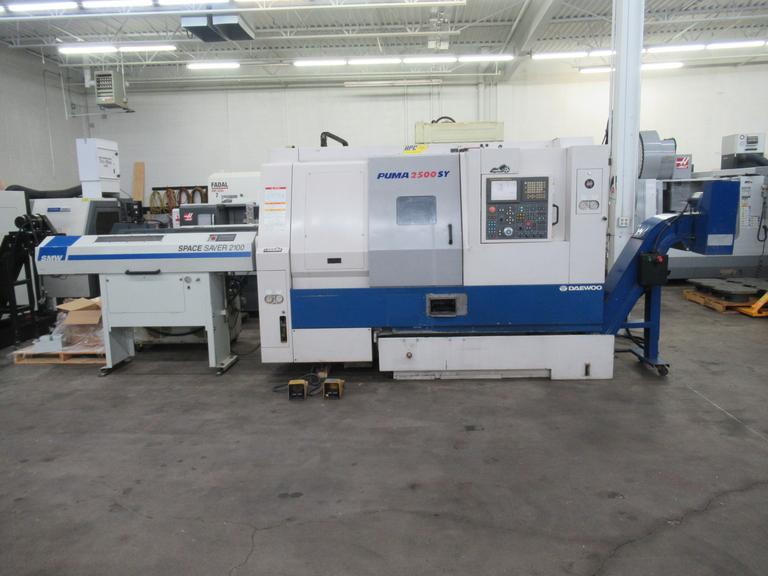 Daewoo Puma 2500SY CNC Turning Center with Live Milling, Full C-Axis on Main and Sub-Spindle, SMW Spacesaver 2100 Barfeed