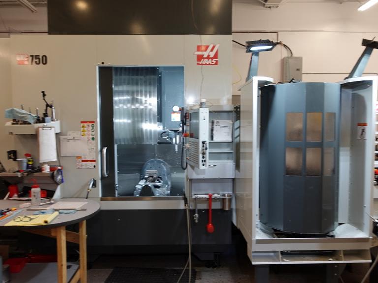 Haas UMC-750 CNC 5-axis Vertical  Machining Center, 11 Station Pallet Pool, 15,000 RPM, Probing, Through Spindle Coolant