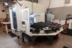 Haas UMC-750 CNC 5-axis Vertical  Machining Center, 11 Station Pallet Pool, 15,000 RPM, Probing, Through Spindle Coolant