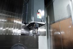 Haas UMC-750 CNC 5-axis Vertical  Machining Center, 11 Station Pallet Pool, 15,000 RPM, Probing, Through Spindle Coolant