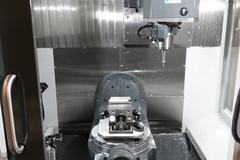Haas UMC-750 CNC 5-axis Vertical  Machining Center, 11 Station Pallet Pool, 15,000 RPM, Probing, Through Spindle Coolant