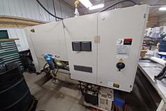 Daewoo Lynx 210C CNC Turning Center with Fanuc Control, Tailstock and Chip Conveyor