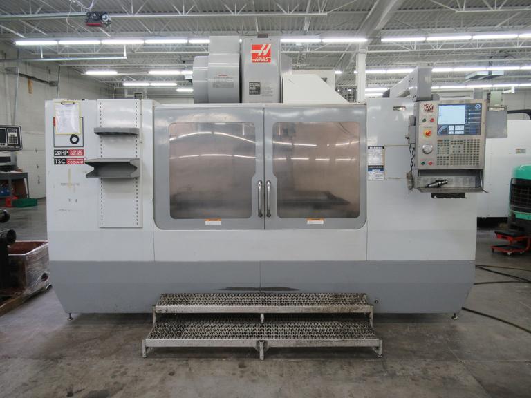 Haas VF-6B/40 CNC Vertical Machining Center with  4th Axis Drive, Probing,  Programmable Coolant Nozzle, Chip Auger, Thru Spindle Coolant