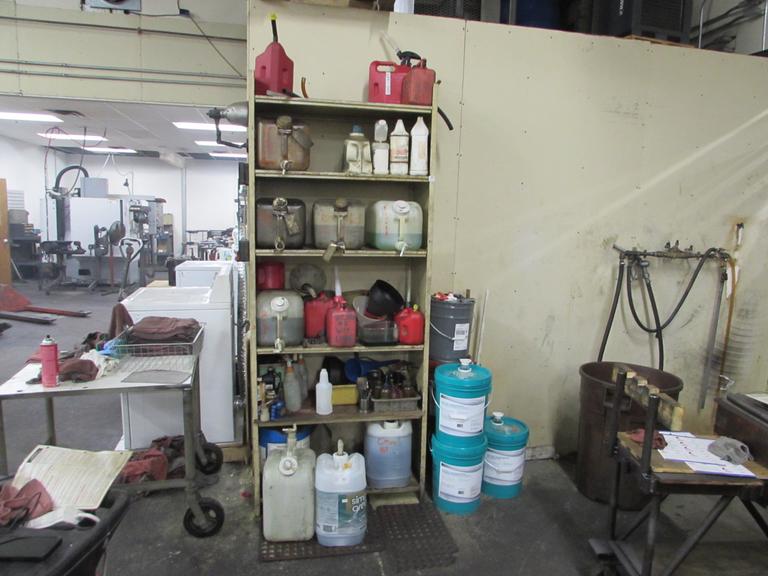 Shelving Unit with COntents of Lube and Cutting Oils