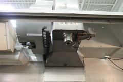 Haas VF-6B/40 CNC Vertical Machining Center with  4th Axis Drive, Probing,  Programmable Coolant Nozzle, Chip Auger, Thru Spindle Coolant
