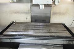 Haas VF-6B/40 CNC Vertical Machining Center with  4th Axis Drive, Probing,  Programmable Coolant Nozzle, Chip Auger, Thru Spindle Coolant