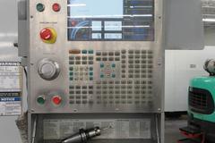 Haas VF-6B/40 CNC Vertical Machining Center with  4th Axis Drive, Probing,  Programmable Coolant Nozzle, Chip Auger, Thru Spindle Coolant