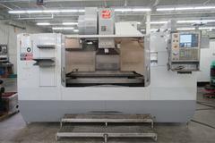 Haas VF-6B/40 CNC Vertical Machining Center with  4th Axis Drive, Probing,  Programmable Coolant Nozzle, Chip Auger, Thru Spindle Coolant
