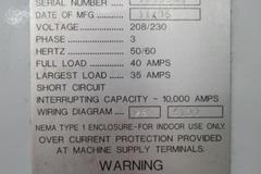 Haas VF-6B/40 CNC Vertical Machining Center with  4th Axis Drive, Probing,  Programmable Coolant Nozzle, Chip Auger, Thru Spindle Coolant